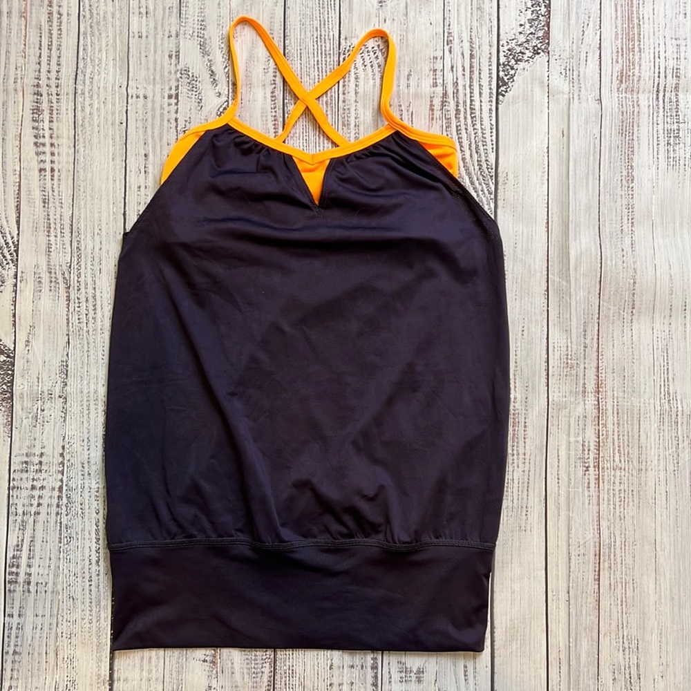 The North Face 2in1 Tank Top. Size XSmall. Excellent Used Condition.